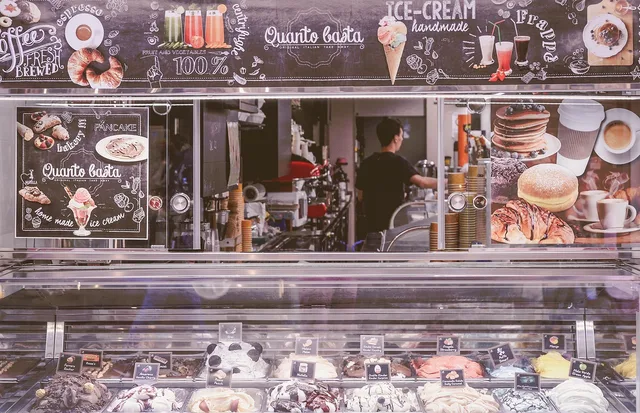 italian, shop, ice, gelato, stand, italy, food, restaurant, city, shopping, italian, gelato, gelato, gelato, gelato, gelato, food, restaurant, restaurant, restaurant, restaurant, restaurant. Why do Chicago gelato shops plan for winter and summer foot traffic?