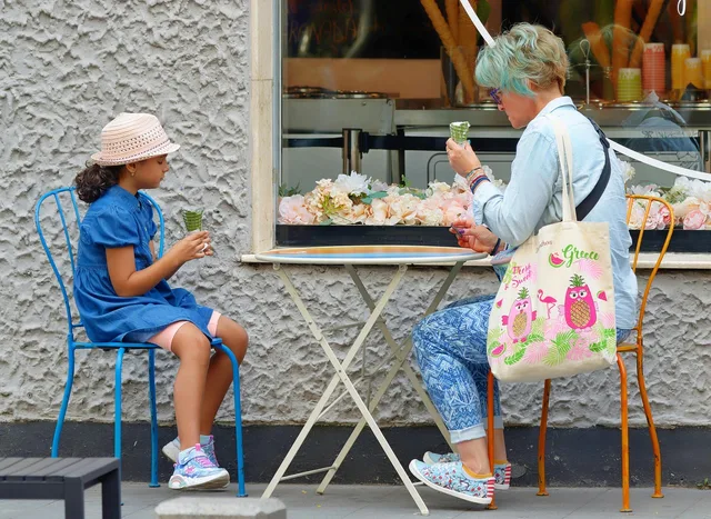 mother and daughter, snack, family, eating, ice cream, stand, the street, town, urban, lifestyle, cake shop. Ice cream shop insurance: what to buy and what to expect to pay